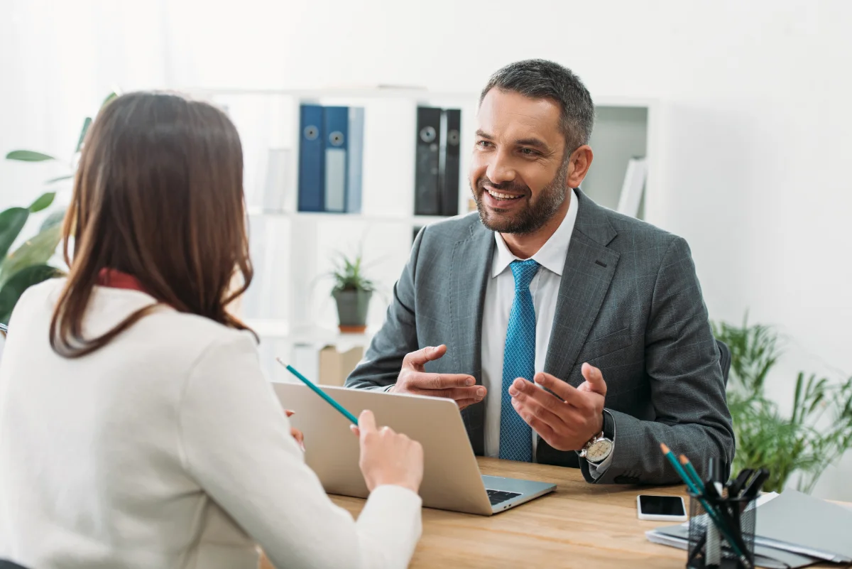 An adviser from the Property Investment Roadmap team meeting with a client